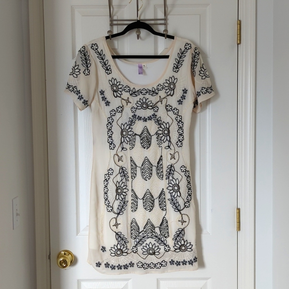 Ivory dress with beaded and embroidered detail. Never worn. Purchased at Frances